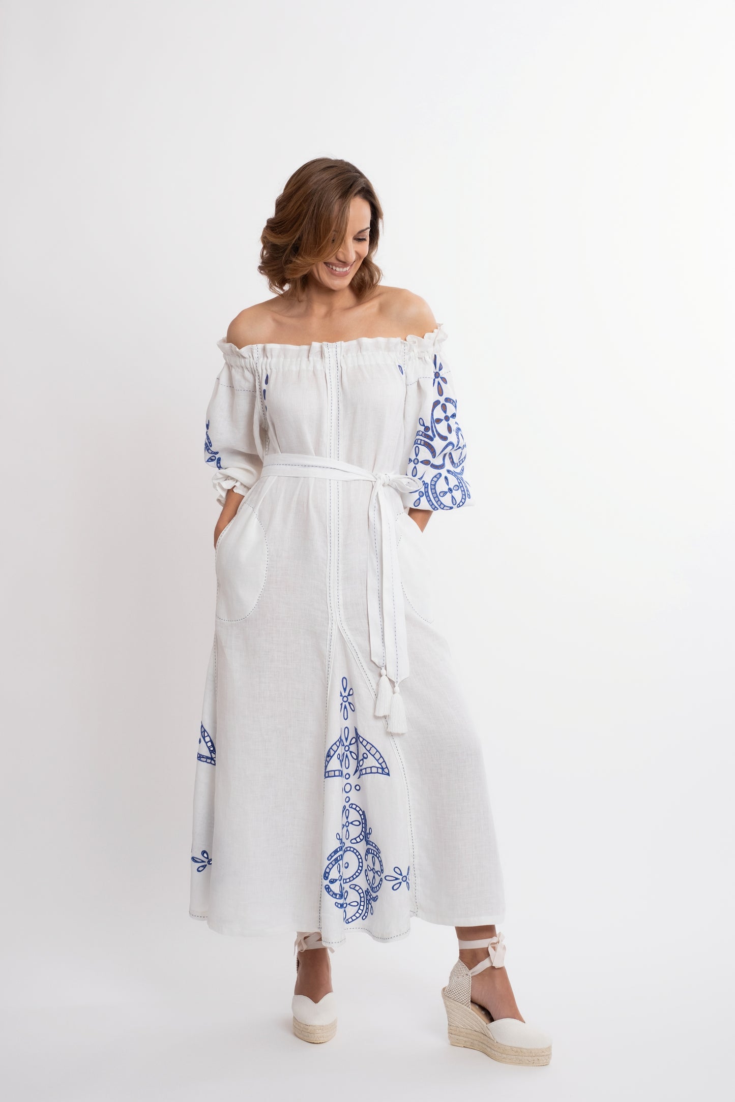 Mikonos: White  boat-neck linen belted dress embroidered in royal blue.