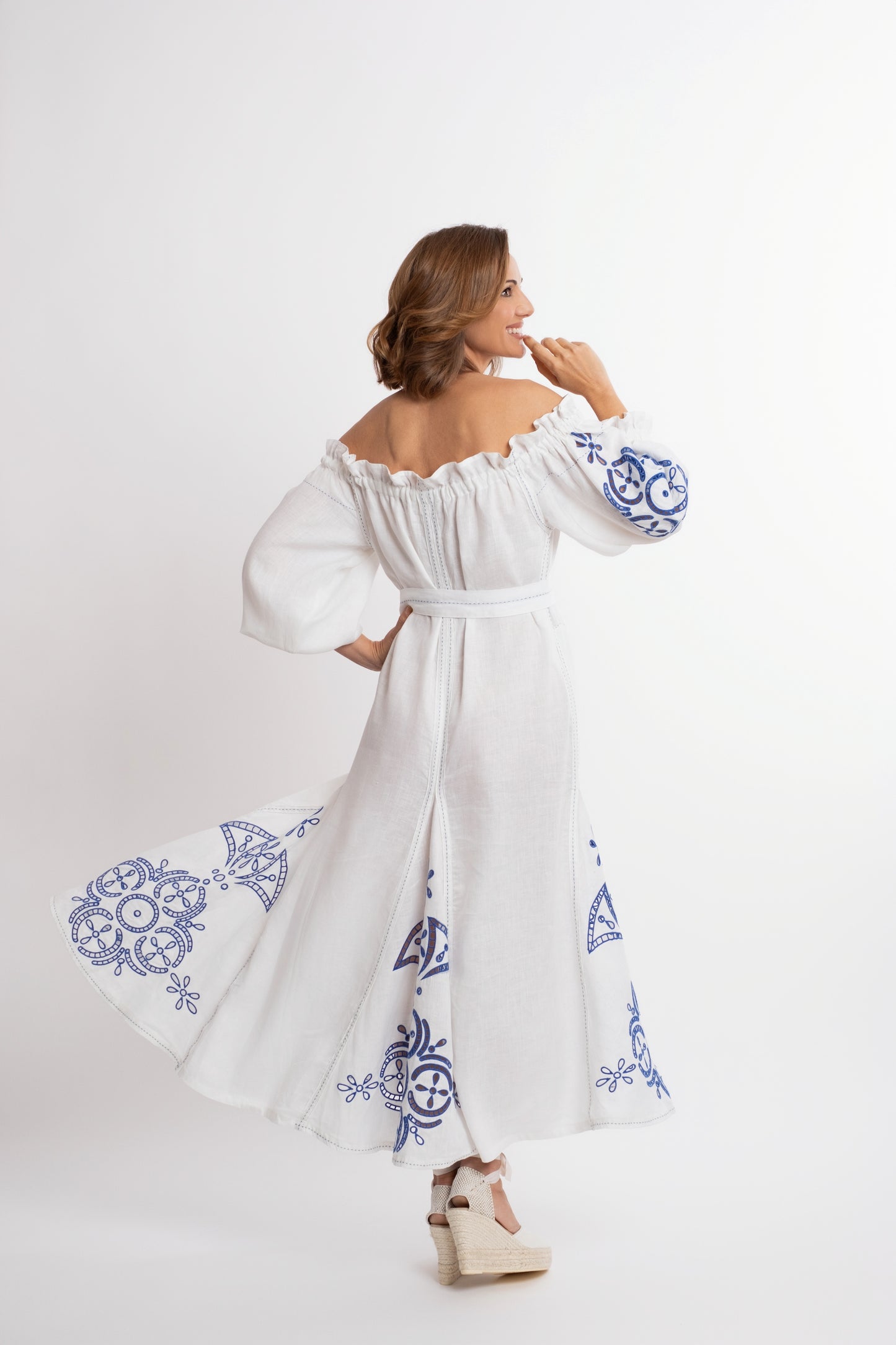 Mikonos: White  boat-neck linen belted dress embroidered in royal blue.