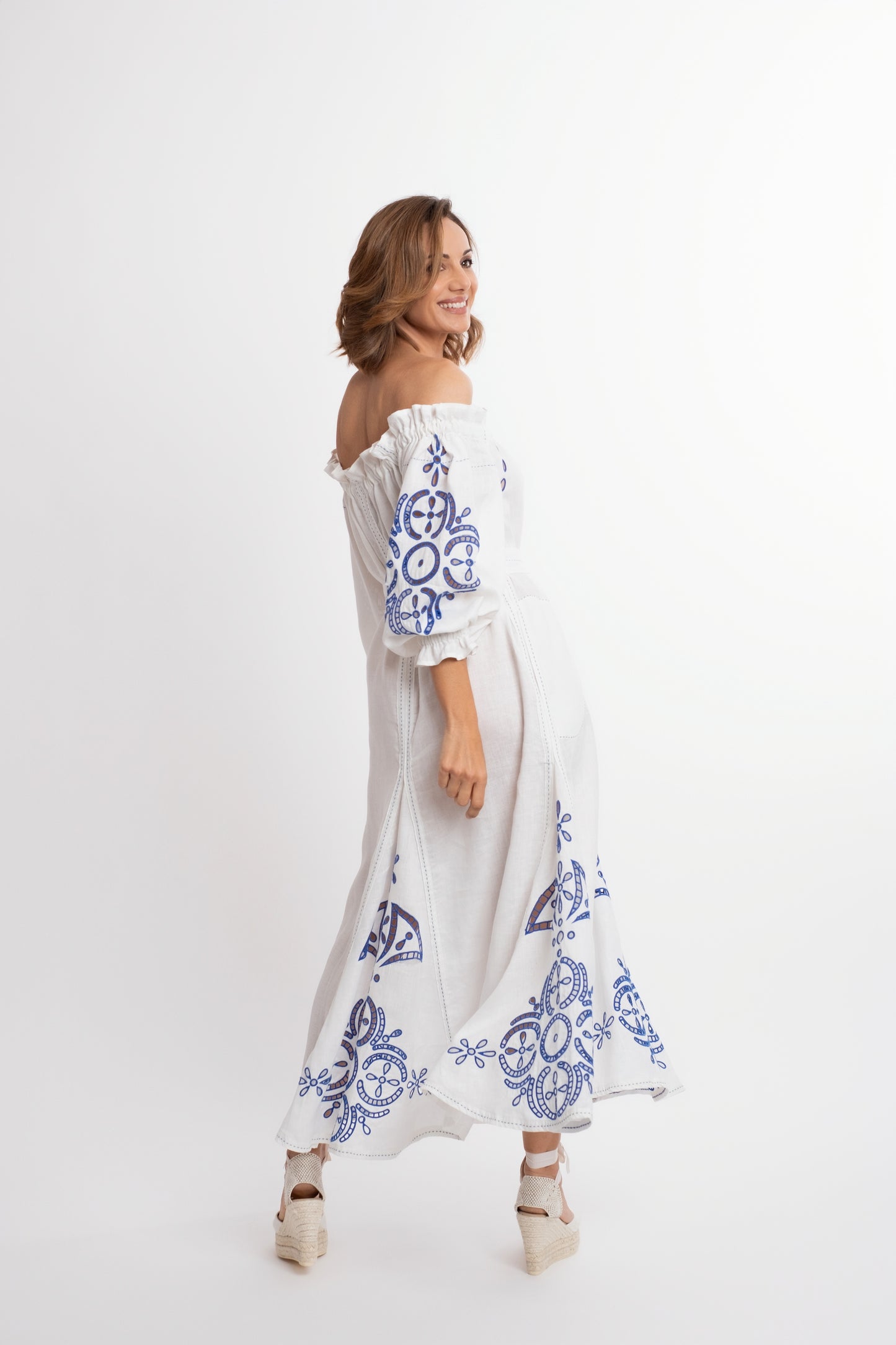 Mikonos: White  boat-neck linen belted dress embroidered in royal blue.