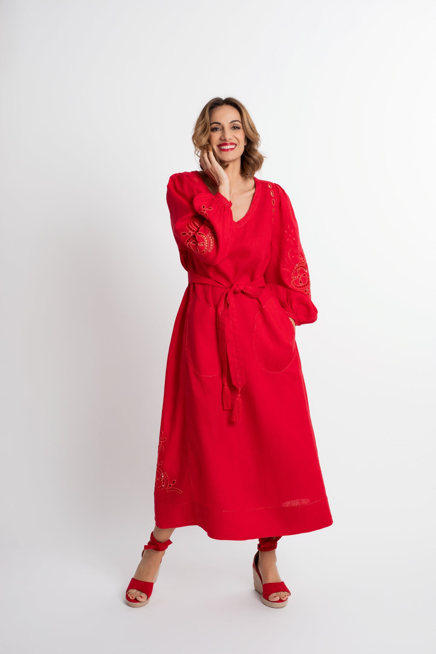 Creta: Red linen belted dress embroidered in gold.