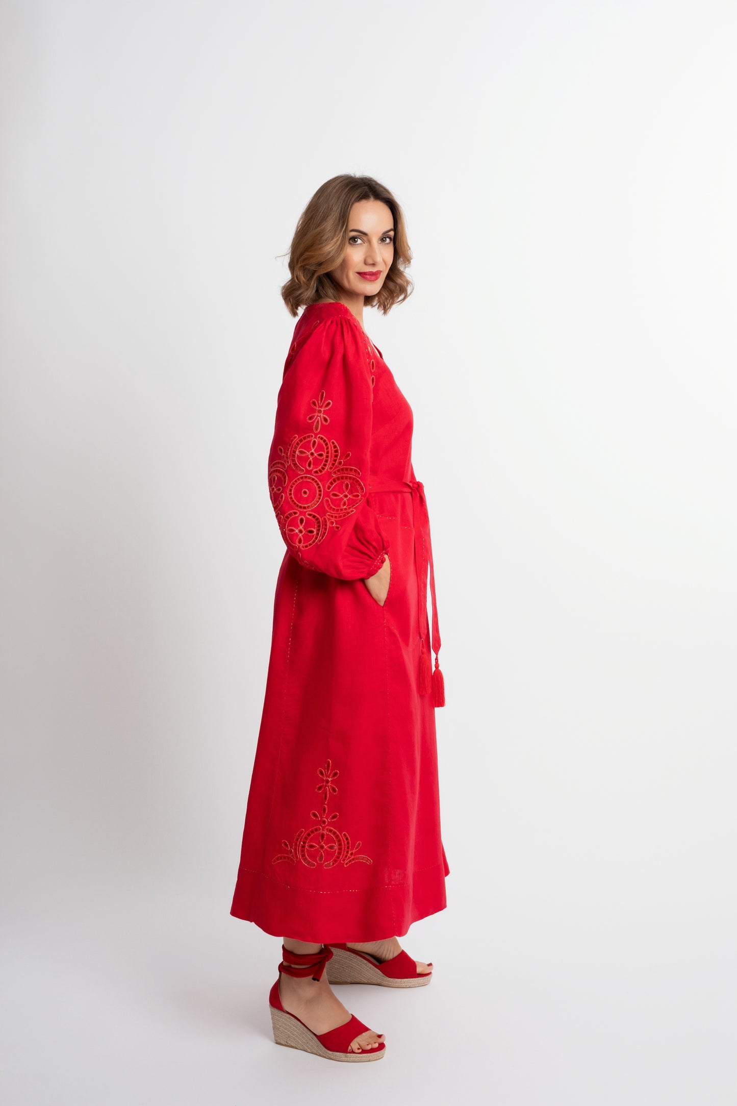 Creta: Red linen belted dress embroidered in gold.