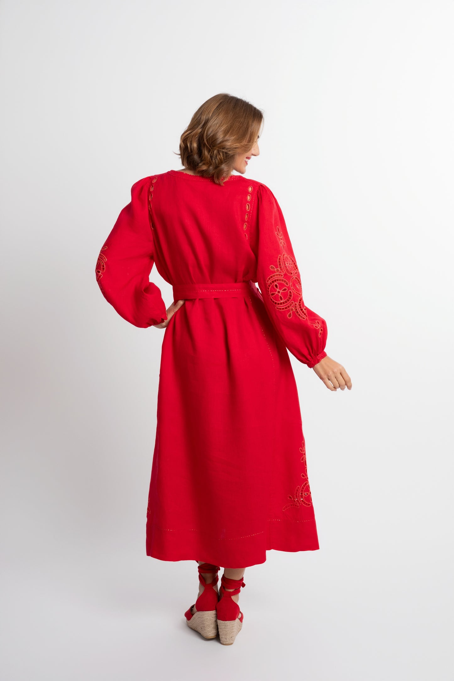 Creta: Red linen belted dress embroidered in gold.
