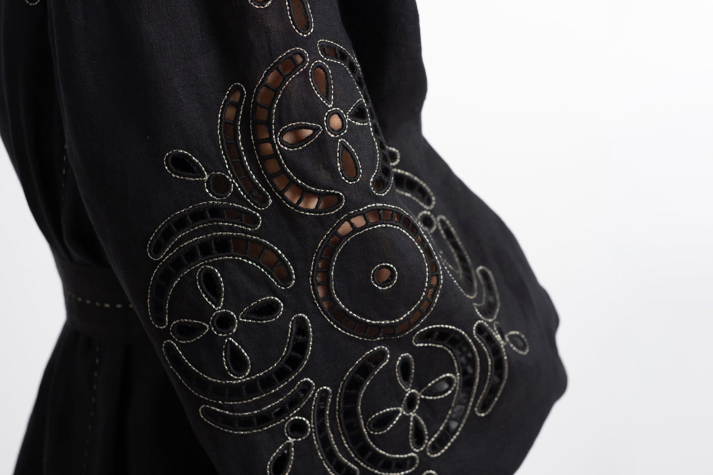 Creta: Black linen belted dress embroidered in gold.