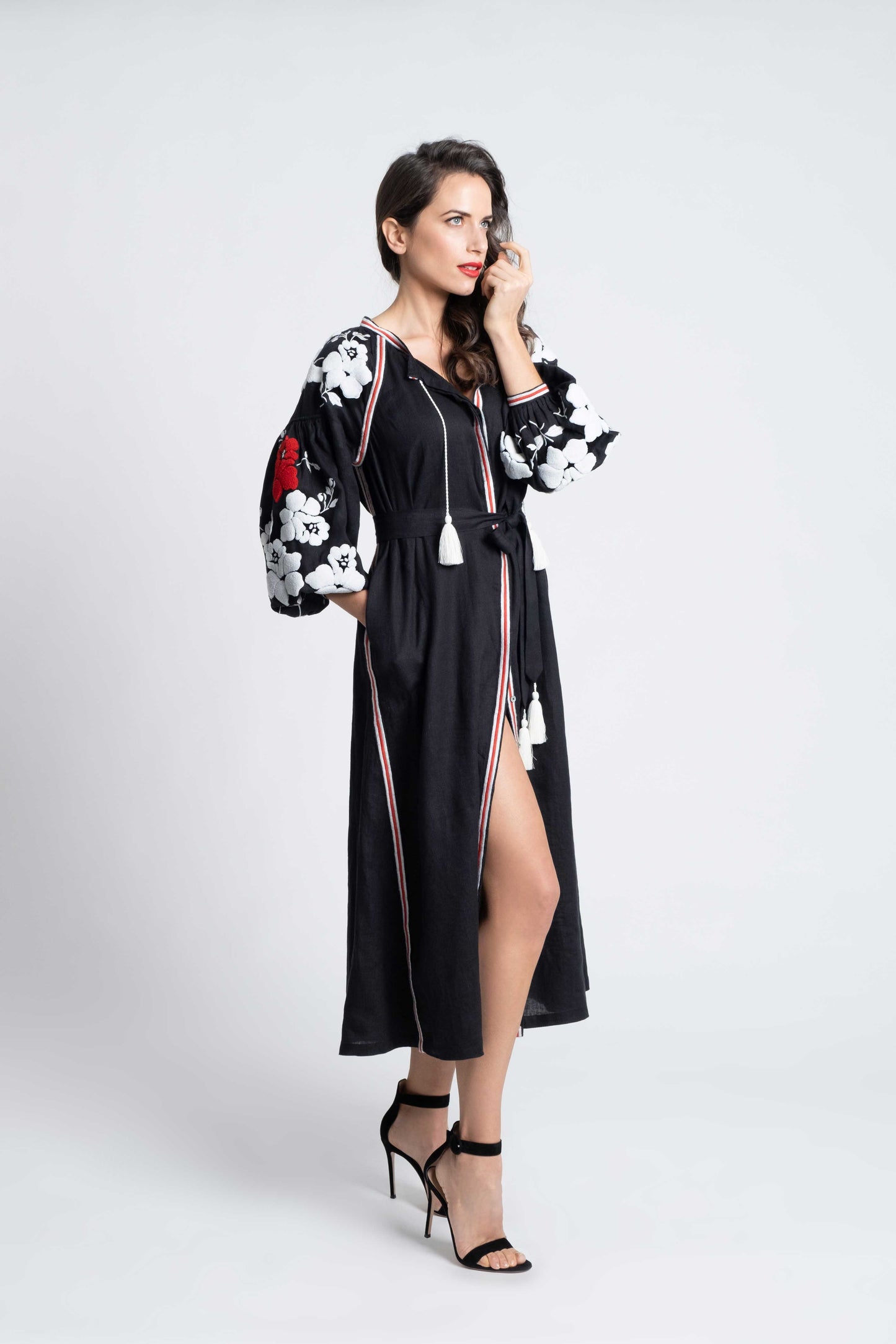 Malibu: Black linen belted dress embroidered in white and red with pompons and  mother of pearl buttons.