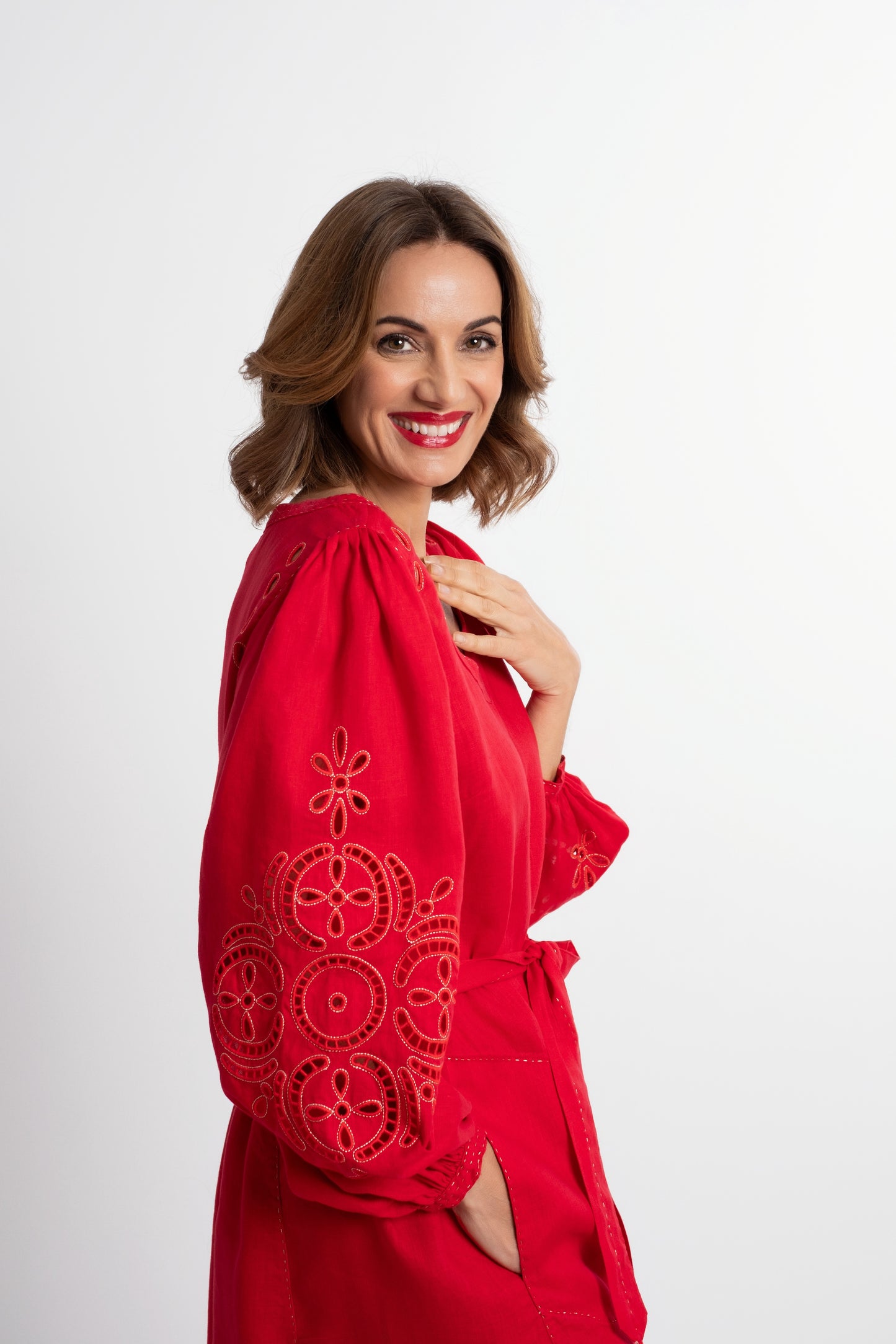 Creta: Red linen belted dress embroidered in gold.