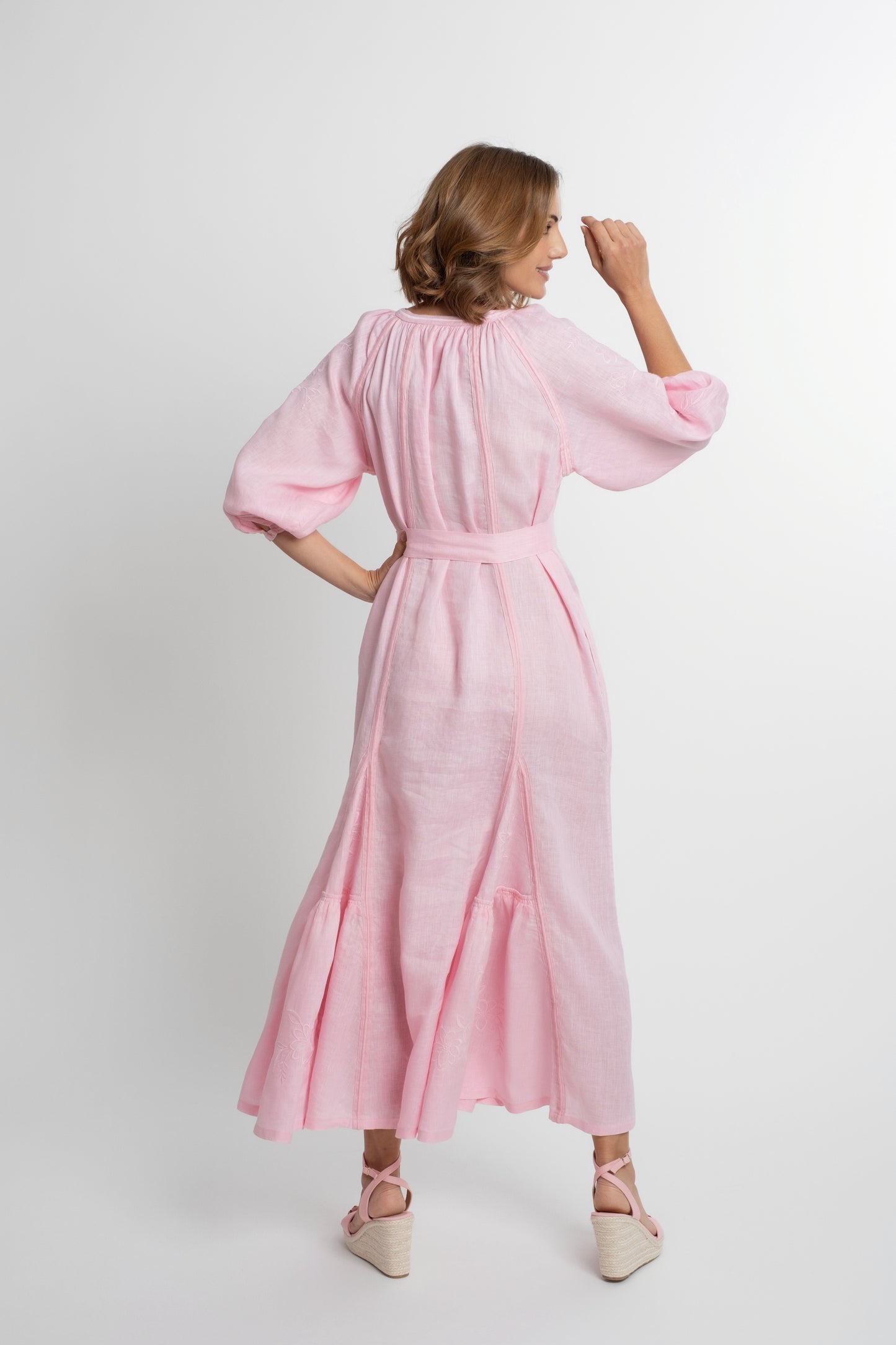 Ibiza: All pink linen belted dress embroidered with pompons and  mother of pearl buttons.