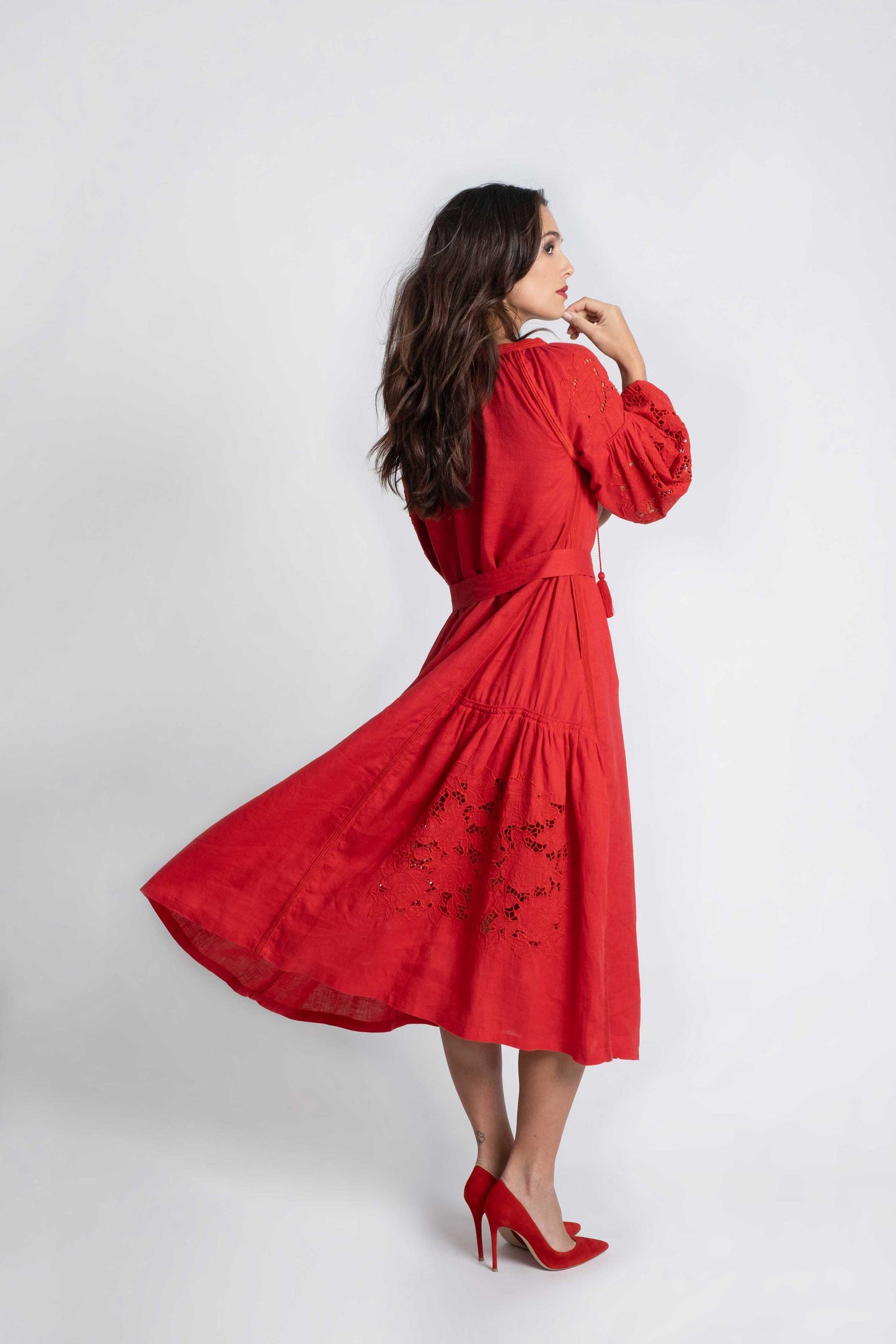 Red linen belted dress swiss embroidered with pompons and  mother of pearl buttons.